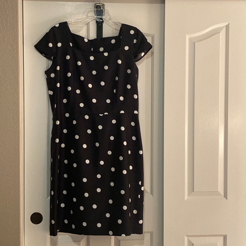 Beautiful Black/ White Polka Dot dress with cap sleeves, square neck and belt.